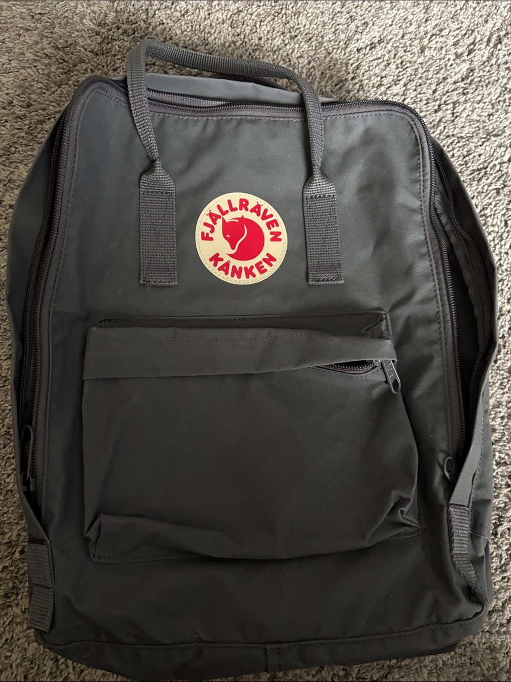 Fjallraven Kanken Backpack in Black with Red Logo